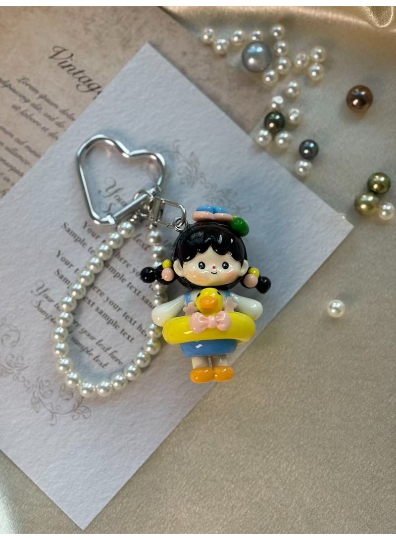 Handcrafted Ceramic Doll Keychain | Pearl Chain Bag Charm - Image 1